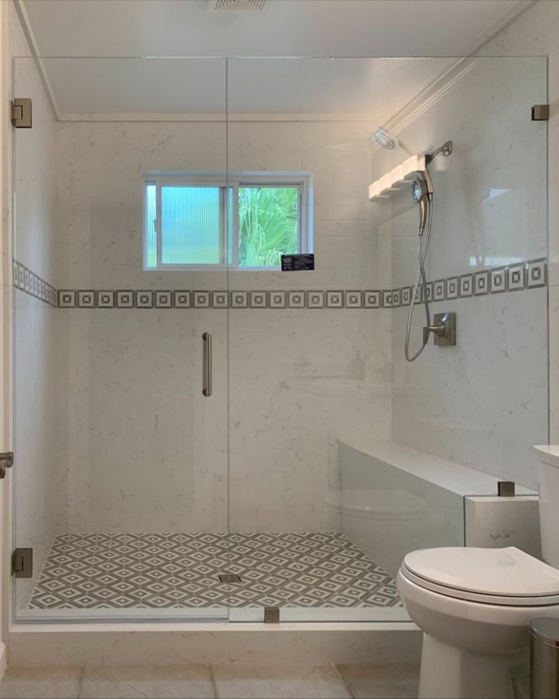 Frameless shower door and inline panel with bench notch in El Cajon, CA