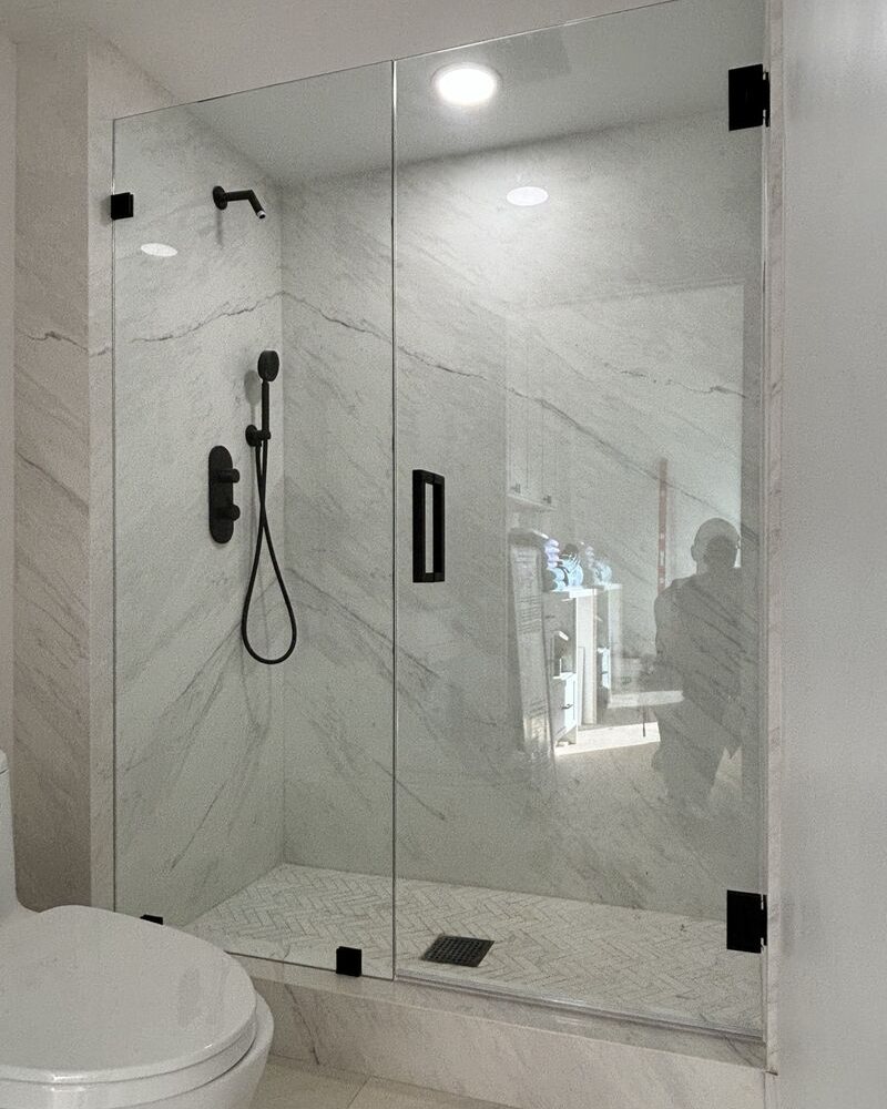 Frameless inline shower door in La Jolla, CA