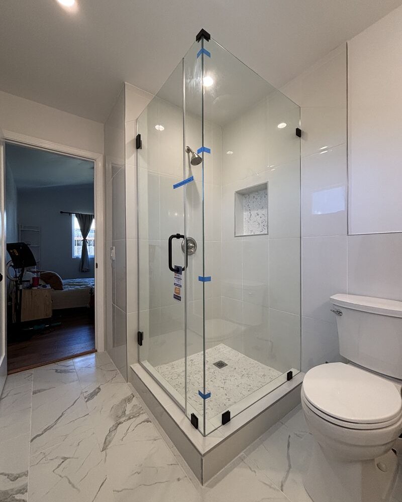 Frameless corner shower enclosure in Oceanside, CA